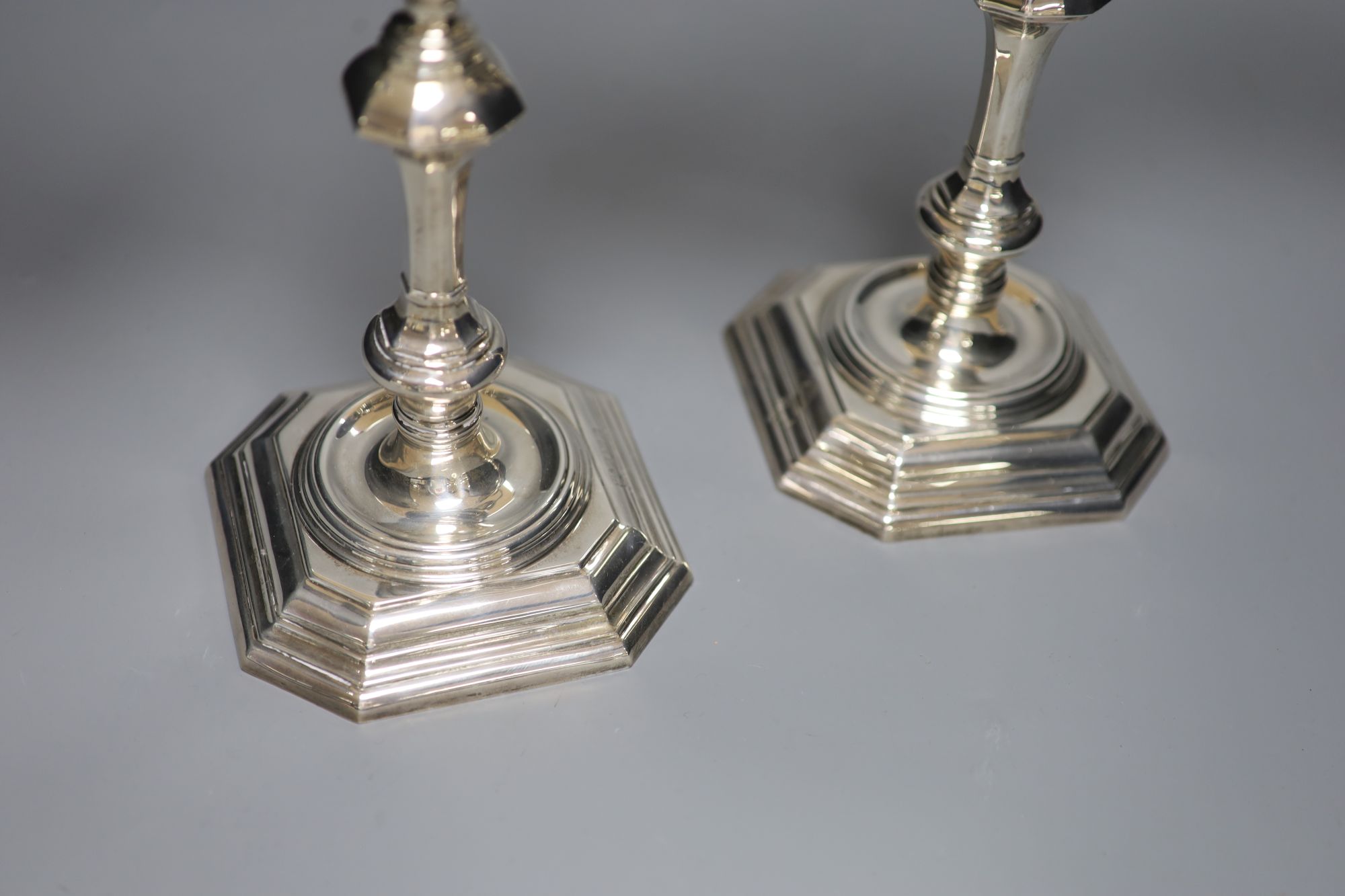 A pair of George I style silver two-branch three-light candelabra, Birmingham 1967, Makers: Elkington & Co,